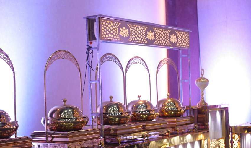Moss-covered stones on shaded forest trail at Dhara