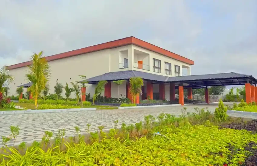 Balcony seating nook with cushioned chairs and lake panorama, Dhara